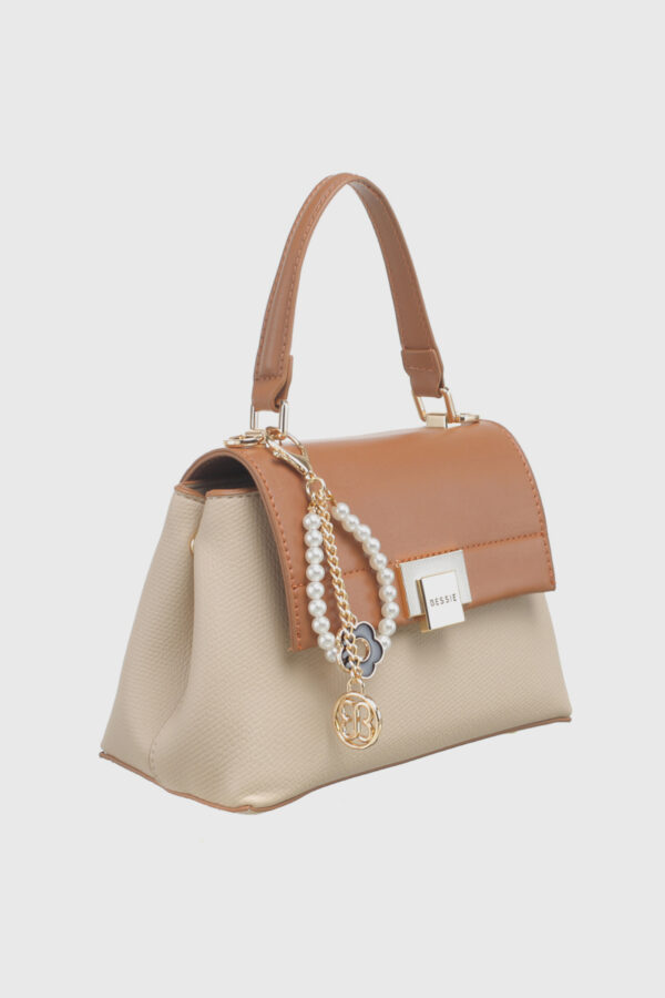 FLAP OVER TOP HANDLE BAG WITH CHARM